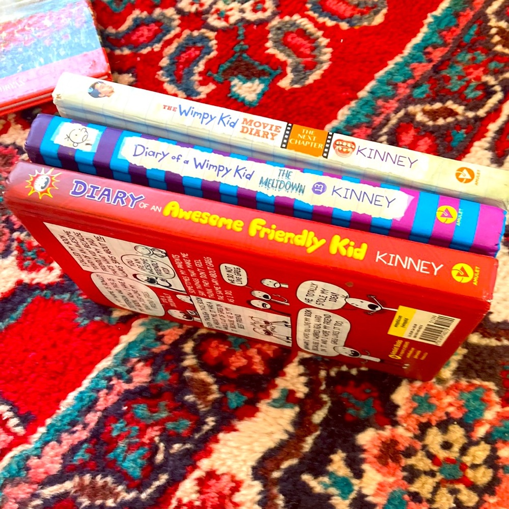 Three Diary of a Wimpy Kid books as shown. By Jeff Kinney.  Hardbacks.